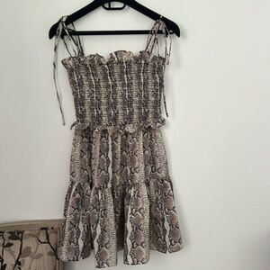 LPA dress with animal pattern. Size  XS never been worn